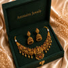 Antique Lakshmi temple jewelry necklace set with traditional jhumka earrings, ruby and emerald stones, and pearl danglings in South Indian bridal style