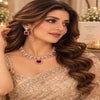 Rose gold Cubic Zirconia necklace set with matching dangling earrings, featuring a linked necklace design, sparkling rectangular centre stones and an elegant statement pendant.
