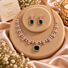 Rose gold Cubic Zirconia necklace set with matching dangling earrings, featuring a linked necklace design, sparkling rectangular centre stones and an elegant statement pendant.