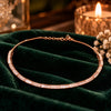 Rose gold Premium Brass hasli necklace featuring alternating rectangular baguette-style stones and sparkling zirconia accents.
