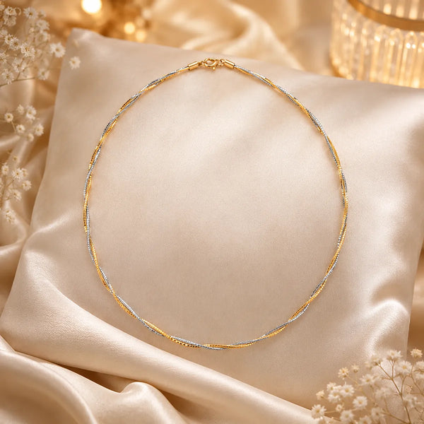 Elegant dual-tone twisted Hasli for women crafted in premium brass with luxurious gold and silver finish