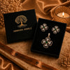 Rose gold Cubic Zirconia pendant set with matching floral-inspired earrings, green centre stones, sparkling clear CZ accents and elegant four-petal design by Ammaira Jewelz.