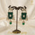Ammaira's Emerald Majesty: Regal Chandelier & Pearl Drops - Ammaira Jewelz