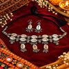 Cowrie shell oxidised necklace set with matching earrings and intricate silver detailing for women