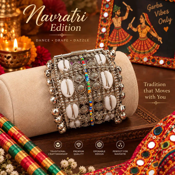 Broad antique silver oxidised alloy openable kada featuring cowrie shells, multicolor beads, and ghungroo charms.