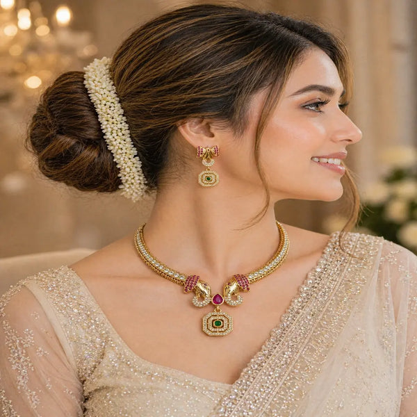 Divine Gajmukha Temple Matte Rose Gold Necklace Set with Ruby & Emerald Accents