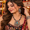 Antique oxidised Radha Krishna necklace set with black thread detailing, statement pendant and matching dangler earrings for women.