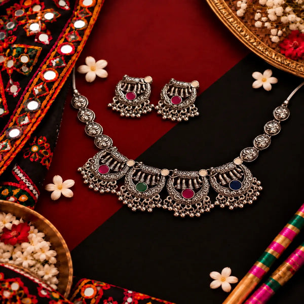 Multicolor oxidised elephant motif necklace set for women with colourful stones, hanging ghungroo and matching traditional jhumka earrings.