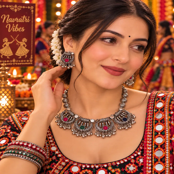 Multicolor oxidised elephant motif necklace set for women with colourful stones, hanging ghungroo and matching traditional jhumka earrings.