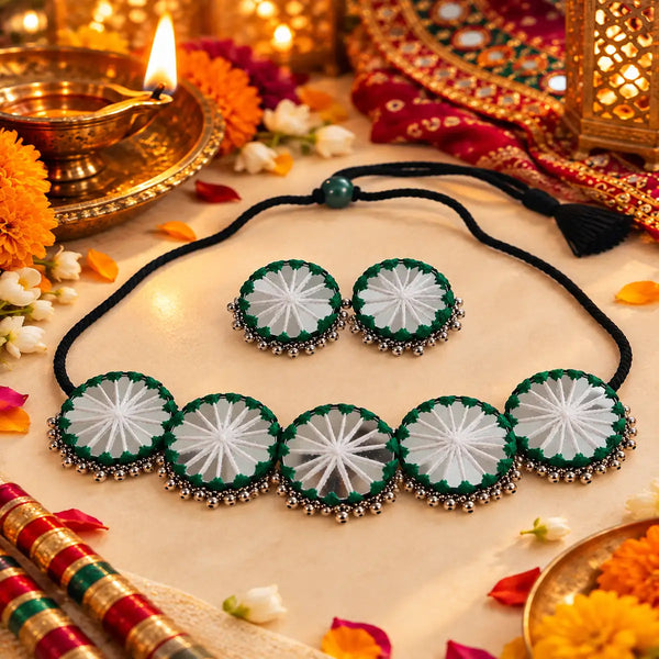 Green threadwork oxidised necklace set with white embroidered motifs and matching earrings
