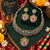 Handcrafted oxidised silver necklace set for women featuring multicolor stones and matching chandelier earrings.