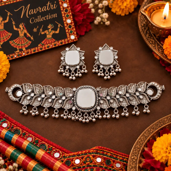 Antique silver-tone oxidized mirrorwork statement choker necklace set for women with ghungroo drops and matching mirrorwork earrings.