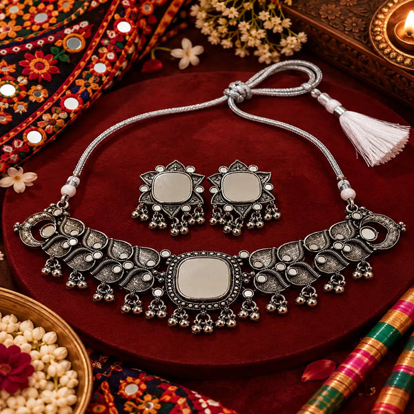 Mirrorwork oxidised silver choker set with intricate motifs, dangling beads and matching earrings