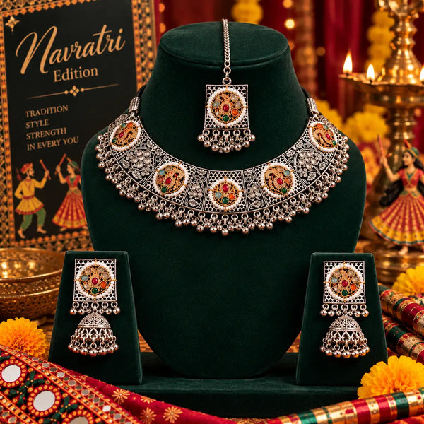 Handcrafted dual-tone oxidised choker necklace set for women with multicolor stones, jhumka earrings, and matching maangtikka.