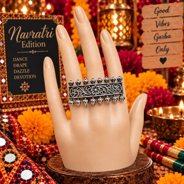 Antique silver oxidised alloy adjustable rectangular filigree statement finger ring for women.
