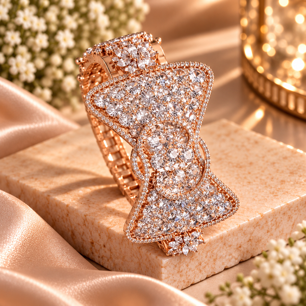 18K rose gold polished premium brass bracelet featuring a bow-inspired design with densely set clear zirconia stones and intricate sparkling borders.