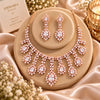 Rose gold Cubic Zirconia floral necklace set with matching dangling earrings featuring pear-shaped stones and cascading sparkle.