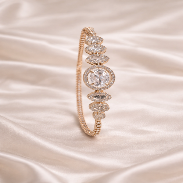 Rose gold bracelet with diamonds on a satin background