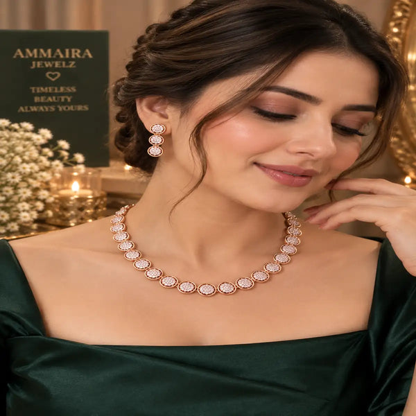 Rose gold Cubic Zirconia round link necklace set with matching three-tier round dangling earrings, featuring sparkling circular stone detailing.