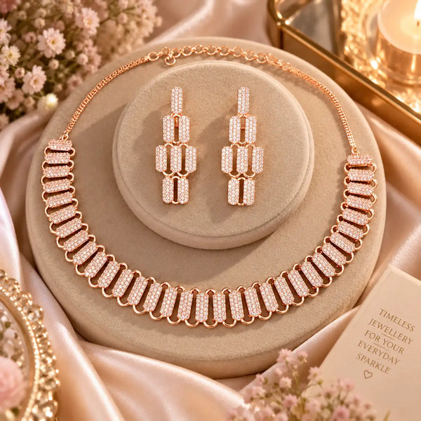 Rose gold Cubic Zirconia rectangular link necklace set with matching dangling earrings for women, featuring an adjustable chain and sparkling design.