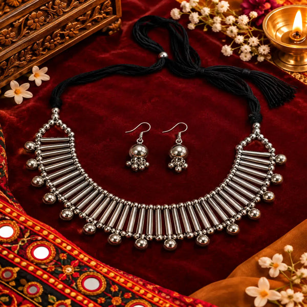Tube-detail oxidised necklace set with silver-tone drops, black thread and matching earrings