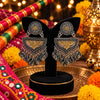Vasudha two-tone fusion alloy statement earrings for women with floral tops, geometric drops and dangling paisley-inspired charms for Navratri.