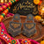 Vasudha two-tone fusion alloy statement earrings for women with floral tops, geometric drops and dangling paisley-inspired charms for Navratri.