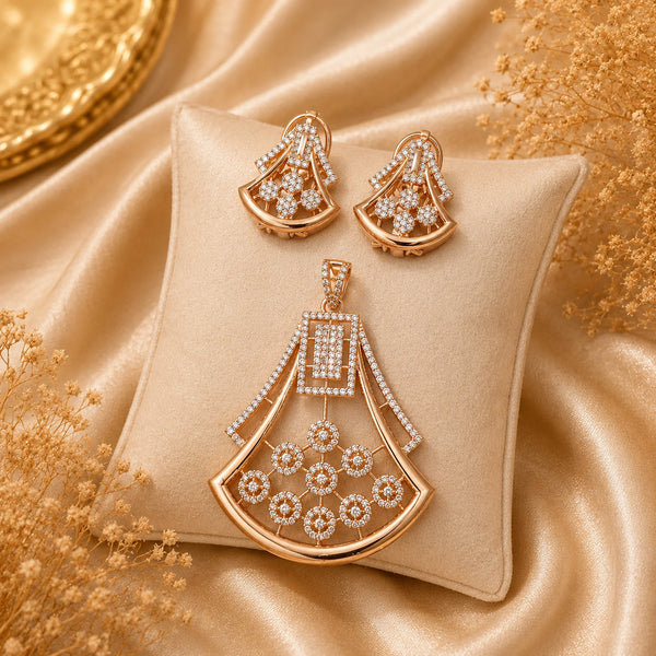 Victorian Aura American Diamond pendant set featuring a fan-shaped floral design with sparkling American Diamonds and matching earrings in gold polish.