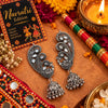 Zoya Darpan lightweight oxidized alloy mirror work jhumka earrings with traditional ear cuffs for Navratri festive wear.