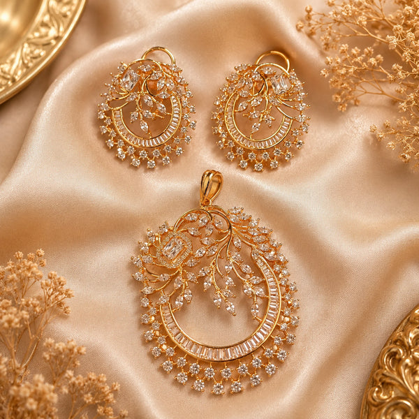 Luxury gold finish American Diamond floral pendant set without chain featuring matching earrings with sparkling baguette and marquise stones.