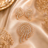 Luxury American Diamond pendant set without chain featuring a cascading circular design with matching gold finish earrings.