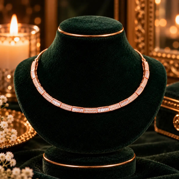 Rose gold Premium Brass hasli necklace featuring alternating rectangular baguette-style stones and sparkling zirconia accents.