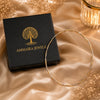 Elegant dual-tone twisted Hasli for women crafted in premium brass with luxurious gold and silver finish
