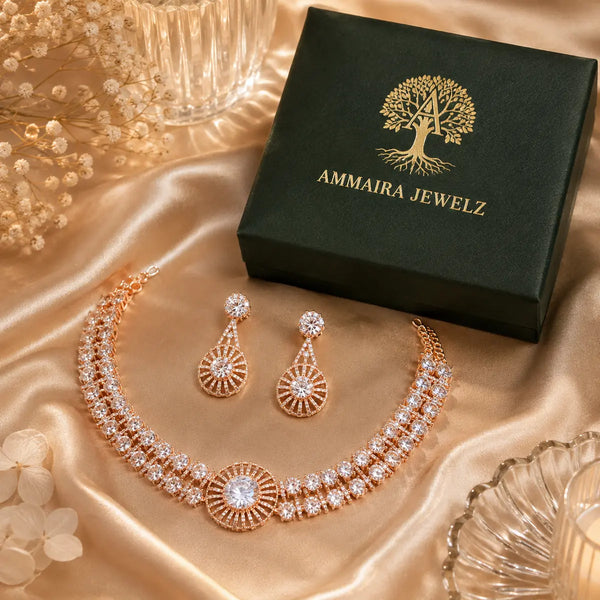 18K rose gold polish American Diamond necklace set with matching drop earrings for women featuring a radiant sunburst design