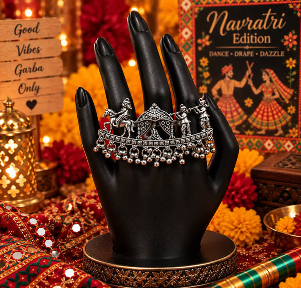 Doli Baraat Heritage alloy oxidized two-finger ring for women with traditional procession-inspired detailing and hanging bead accents
