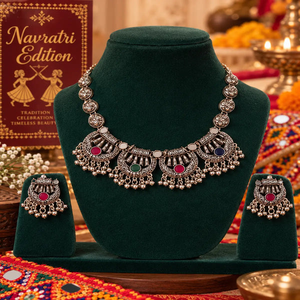 Multicolor oxidised elephant motif necklace set for women with colourful stones, hanging ghungroo and matching traditional jhumka earrings.