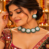 Green threadwork oxidised necklace set with white embroidered motifs and matching earrings