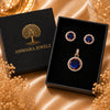 Imperial sapphire blue halo pendant with matching American diamond stud earrings in premium gold-tone finish, pendant set without chain.
