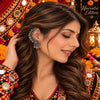 Kesarika lightweight oxidized alloy jhumka earrings with ornamental ear cuffs, traditional design for Navratri festive wear.