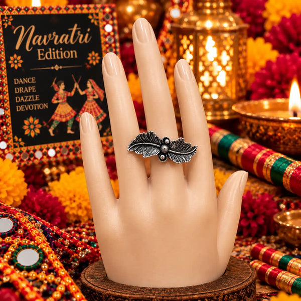 Antique silver oxidised alloy adjustable feather leaf statement finger ring for women.