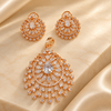 Rose gold American diamond pendant set in premium brass featuring a marquise stone design, ornate circular pendant and matching statement earrings.