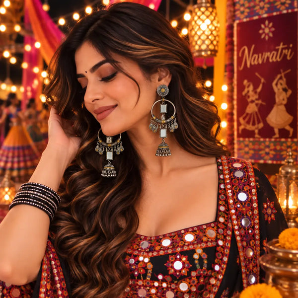 Two-tone oxidized alloy mirror-work fusion earrings for women featuring circular hoops, rectangular mirror accents and traditional jhumka-inspired drops.