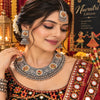 Handcrafted dual-tone oxidised choker necklace set for women with multicolor stones, jhumka earrings, and matching maangtikka.