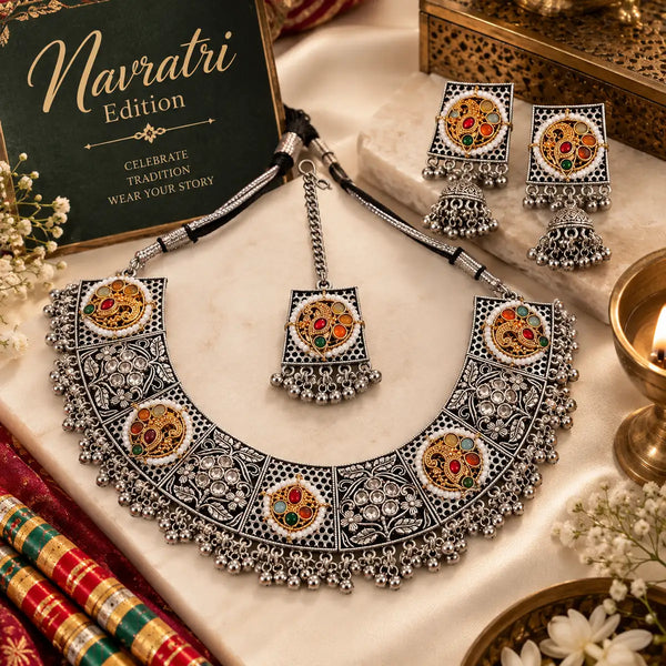 Handcrafted dual-tone oxidised choker necklace set for women with multicolor stones, jhumka earrings, and matching maangtikka.