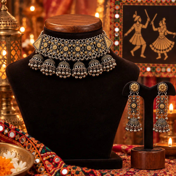 Statement two tone silver and gold oxidized choker necklace with jhumka drops and matching long jhumka earrings for women.