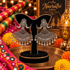 Oxidized German silver mirror work dancing woman dangler earrings for women with intricate traditional patterns and festive Navratri styling.