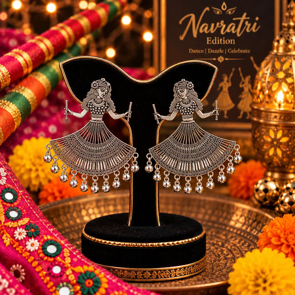 Oxidized German silver mirror work dancing woman dangler earrings for women with intricate traditional patterns and festive Navratri styling.