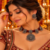 Peacock design oxidised necklace set with green thread, matching earrings and pendant for women