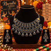 Royal German silver statement necklace set for women with antique silver and gold-tone detailing, intricate pendant and matching long jhumka earrings by Ammaira Jewelz.