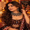 Royal German silver statement necklace set for women with antique silver and gold-tone detailing, intricate pendant and matching long jhumka earrings by Ammaira Jewelz.